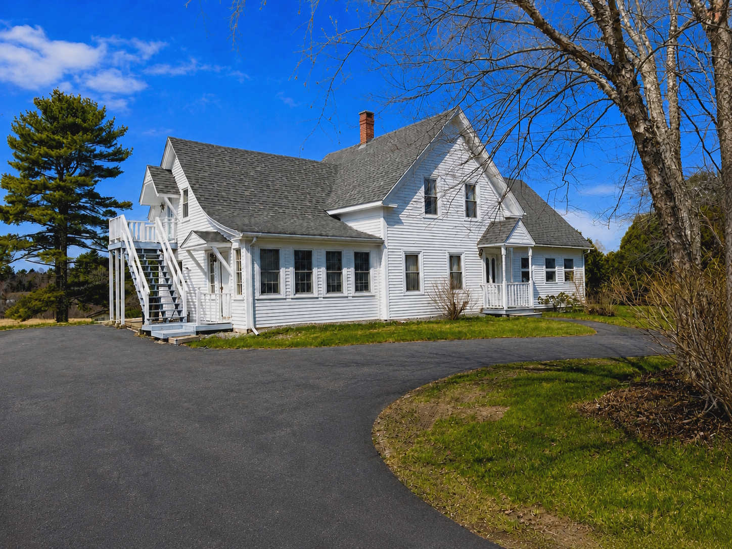 White 3,500 sq ft farmhouse with attached dental office on 1.5 acres in Warren, Maine